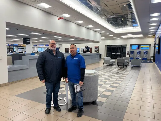 Skyward supervisor and client walking a cleaned facility lobby